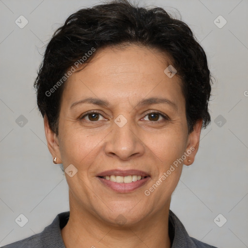 Joyful white adult female with short  brown hair and brown eyes