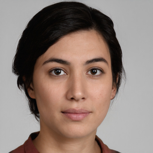 Neutral white young-adult female with medium  black hair and brown eyes