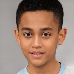 Joyful white child male with short  brown hair and brown eyes