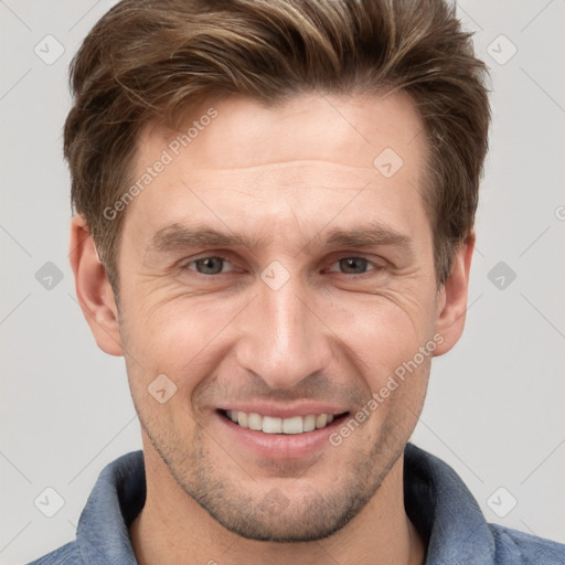 Joyful white adult male with short  brown hair and grey eyes