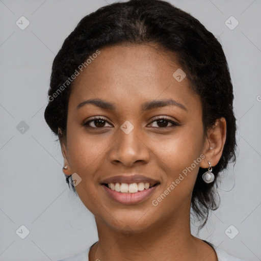 Joyful latino young-adult female with long  black hair and brown eyes