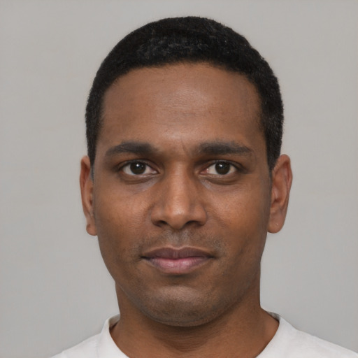 Neutral black young-adult male with short  black hair and brown eyes