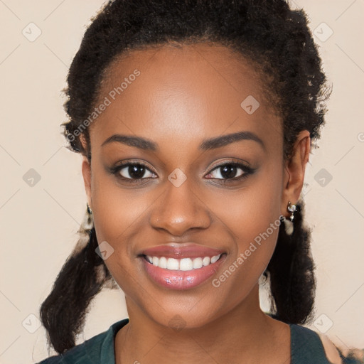 Joyful black young-adult female with long  brown hair and brown eyes