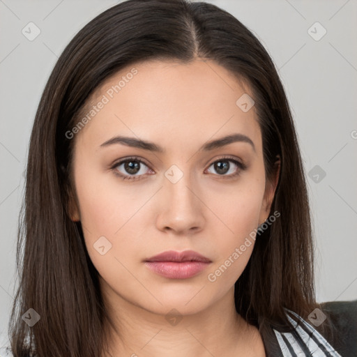 Neutral white young-adult female with long  brown hair and brown eyes