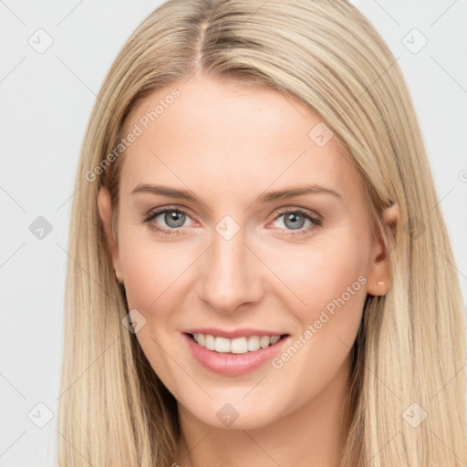 Joyful white young-adult female with long  brown hair and blue eyes