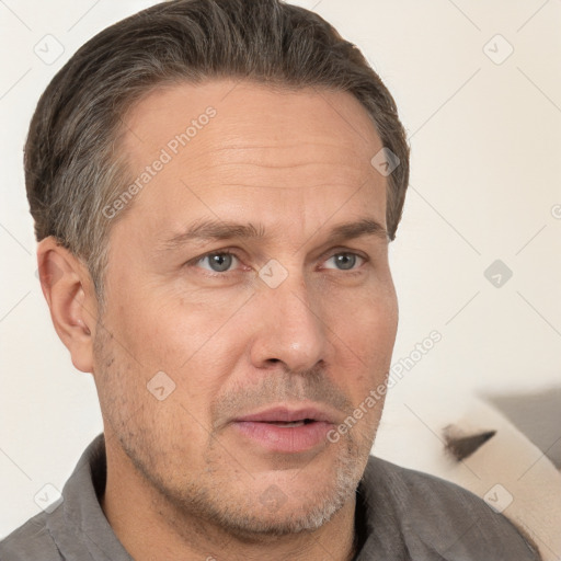 Neutral white adult male with short  brown hair and brown eyes