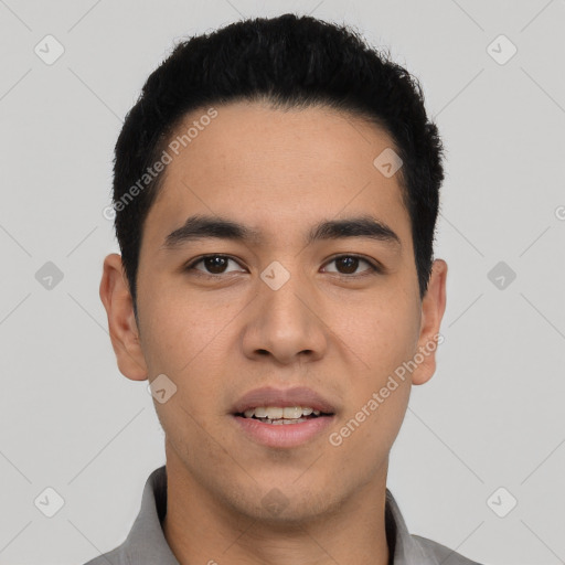 Joyful asian young-adult male with short  black hair and brown eyes