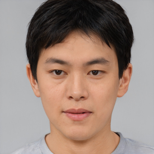 Neutral asian young-adult male with short  brown hair and brown eyes