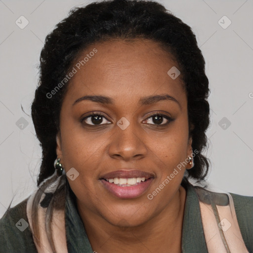 Joyful black young-adult female with long  brown hair and brown eyes