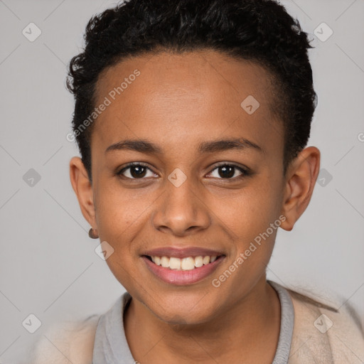 Joyful black young-adult female with short  brown hair and brown eyes