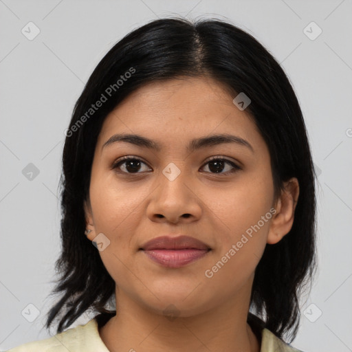 Joyful asian young-adult female with medium  black hair and brown eyes