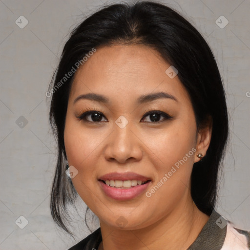 Joyful asian young-adult female with medium  black hair and brown eyes