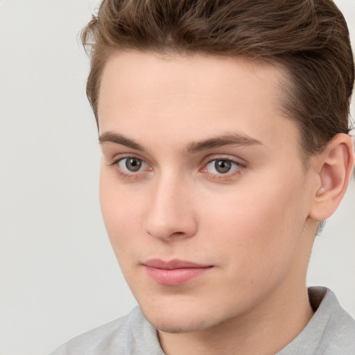 Neutral white young-adult male with short  brown hair and brown eyes