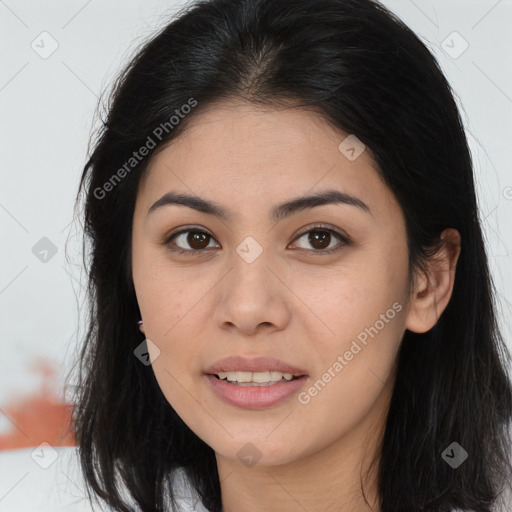 Joyful asian young-adult female with long  brown hair and brown eyes