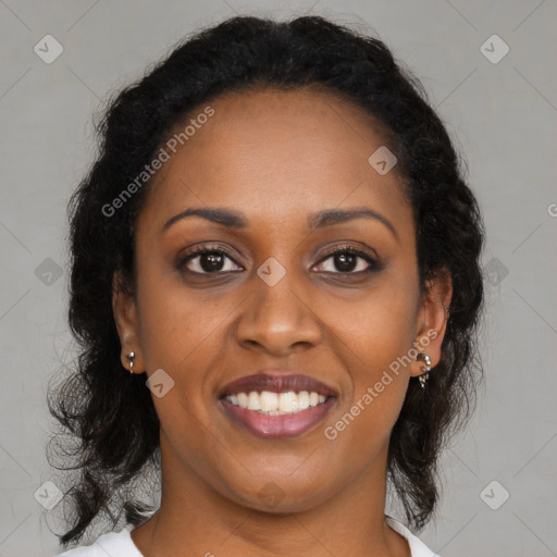 Joyful black young-adult female with medium  brown hair and brown eyes