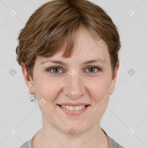 Joyful white young-adult female with short  brown hair and grey eyes