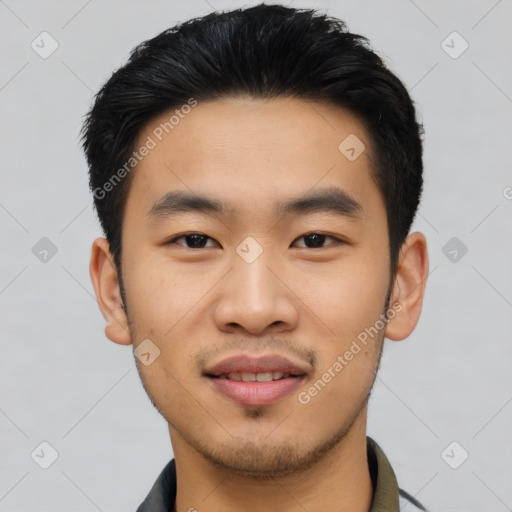 Joyful asian young-adult male with short  black hair and brown eyes