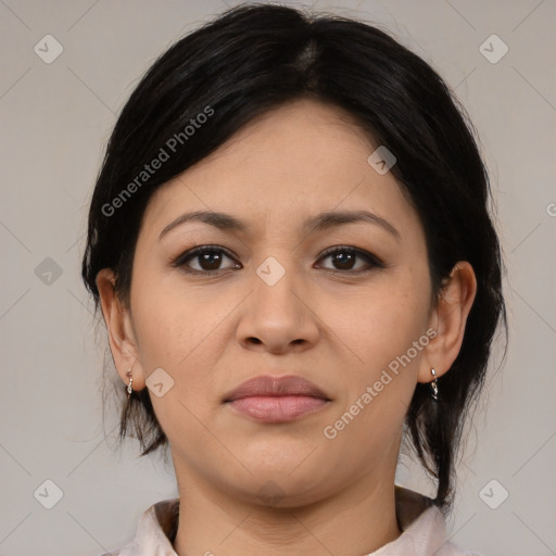 Joyful latino young-adult female with medium  brown hair and brown eyes