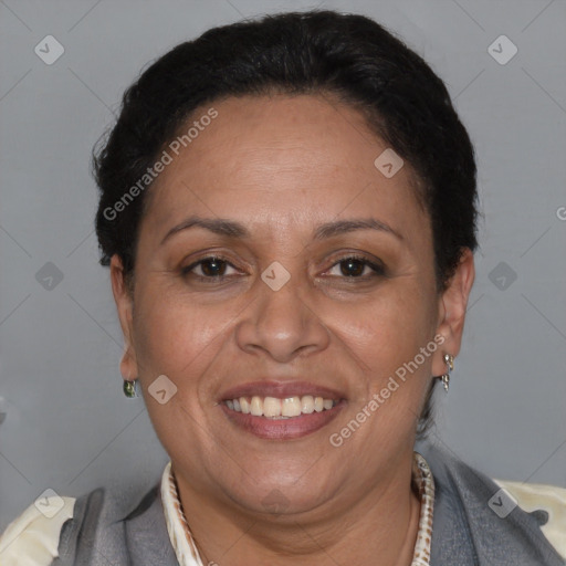Joyful latino adult female with short  brown hair and brown eyes