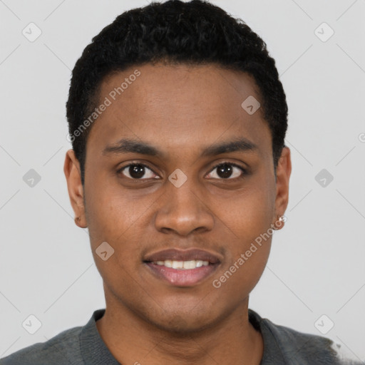 Joyful black young-adult male with short  black hair and brown eyes