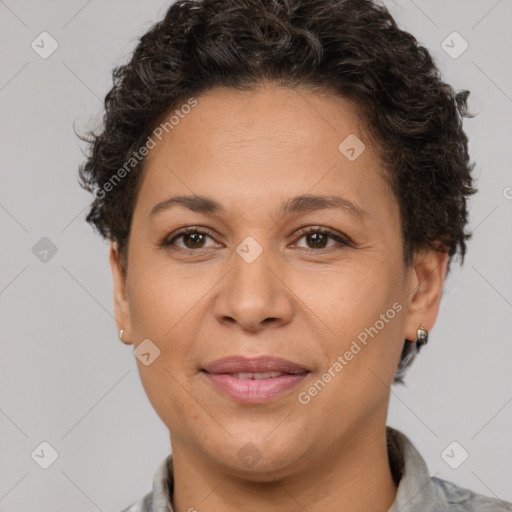 Joyful white adult female with short  brown hair and brown eyes