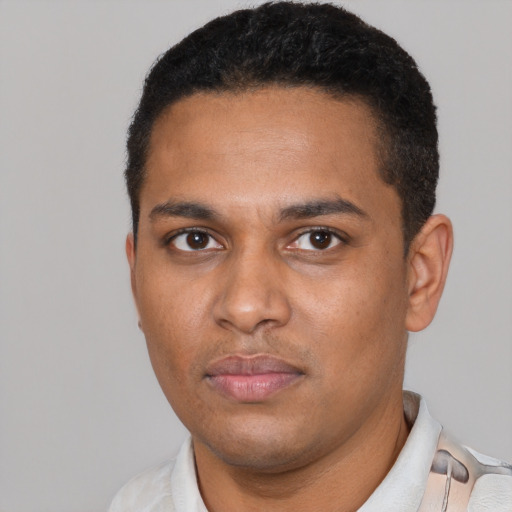 Neutral latino young-adult male with short  black hair and brown eyes