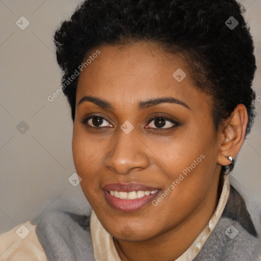 Joyful black young-adult female with short  black hair and brown eyes