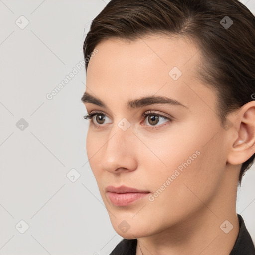 Neutral white young-adult female with medium  brown hair and brown eyes