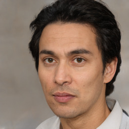 Neutral white adult male with short  black hair and brown eyes
