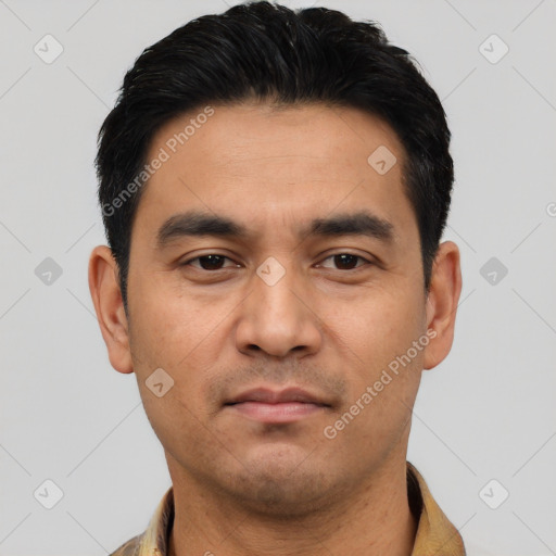 Joyful asian young-adult male with short  black hair and brown eyes