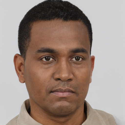 Neutral black young-adult male with short  brown hair and brown eyes