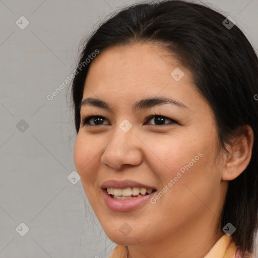 Joyful latino young-adult female with medium  brown hair and brown eyes