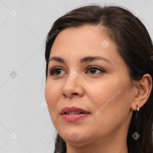 Joyful white young-adult female with medium  brown hair and brown eyes