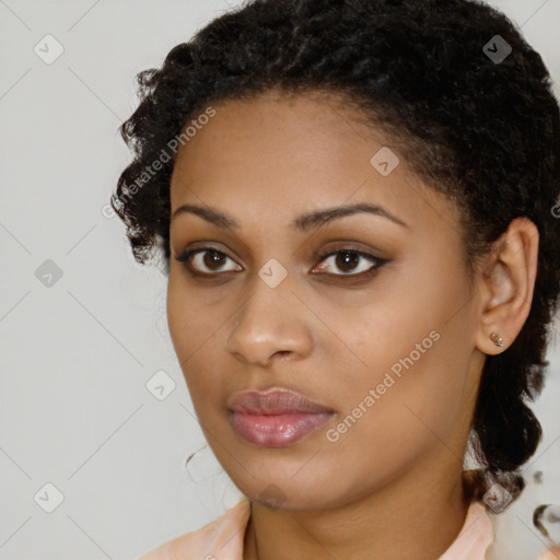 Neutral black young-adult female with medium  brown hair and brown eyes