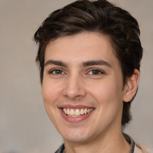 Joyful white young-adult male with medium  brown hair and brown eyes