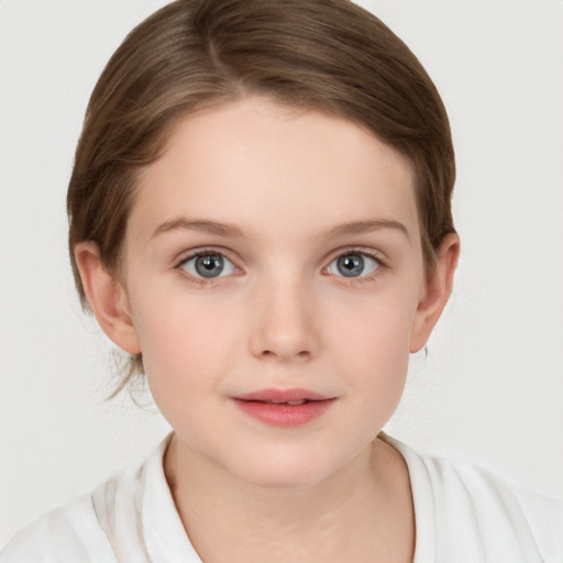 Joyful white child female with medium  brown hair and grey eyes