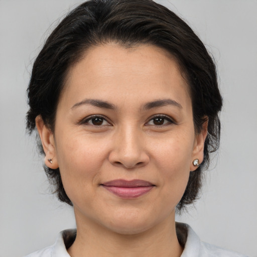 Joyful white young-adult female with medium  brown hair and brown eyes