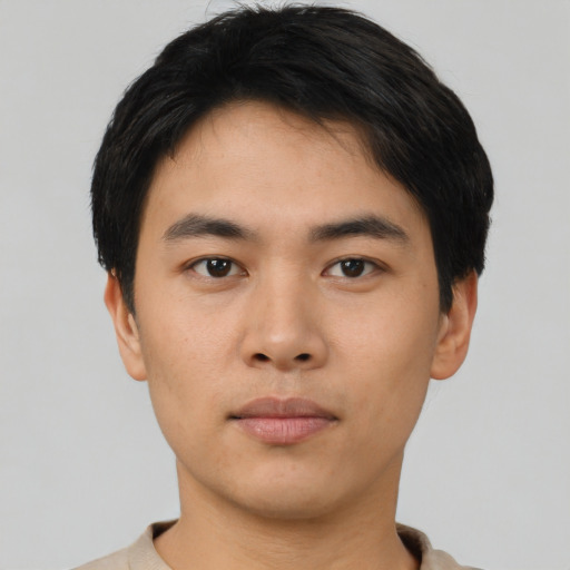 Neutral asian young-adult male with short  black hair and brown eyes