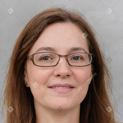 Joyful white adult female with long  brown hair and brown eyes