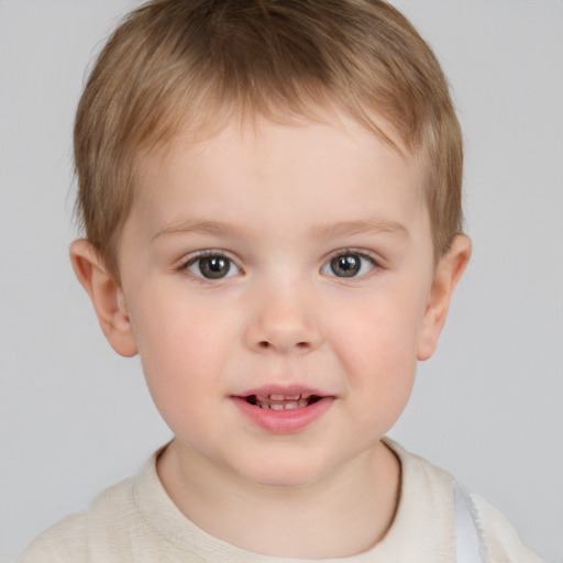 Joyful white child male with short  brown hair and brown eyes