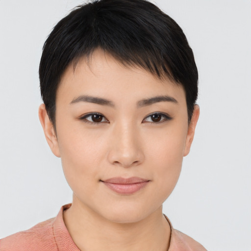 Joyful asian young-adult female with short  brown hair and brown eyes