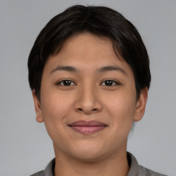 Joyful asian young-adult female with short  brown hair and brown eyes