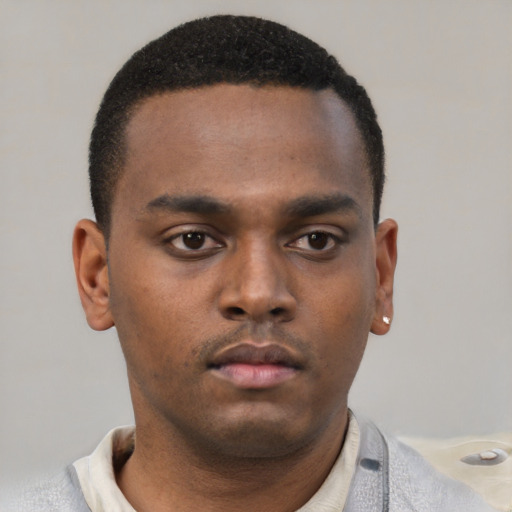 Neutral latino young-adult male with short  brown hair and brown eyes