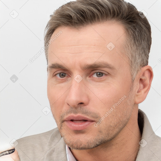 Neutral white adult male with short  brown hair and brown eyes