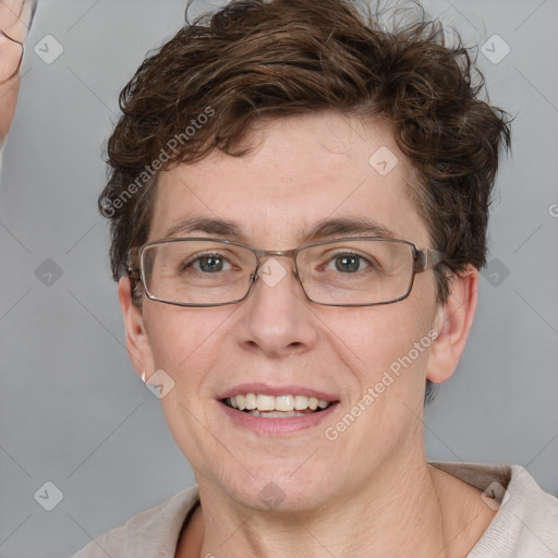 Joyful white adult male with short  brown hair and grey eyes