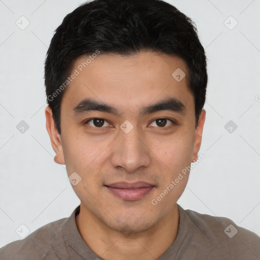 Joyful white young-adult male with short  black hair and brown eyes