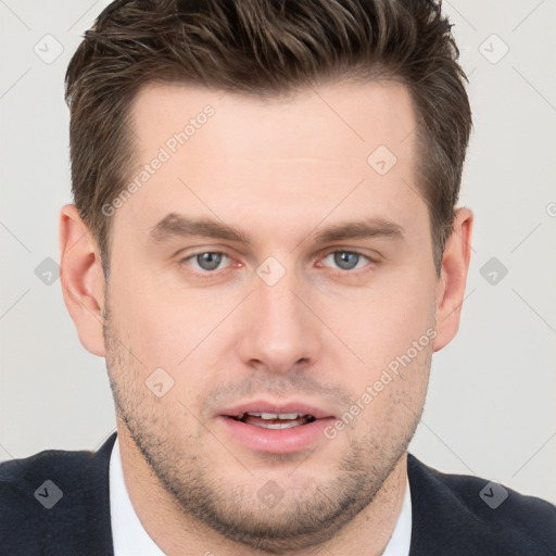 Neutral white young-adult male with short  brown hair and grey eyes