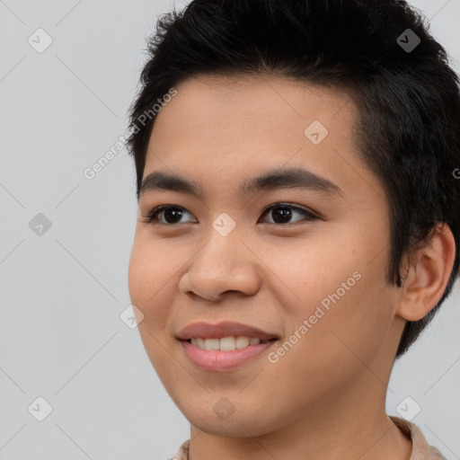 Joyful asian young-adult male with short  brown hair and brown eyes