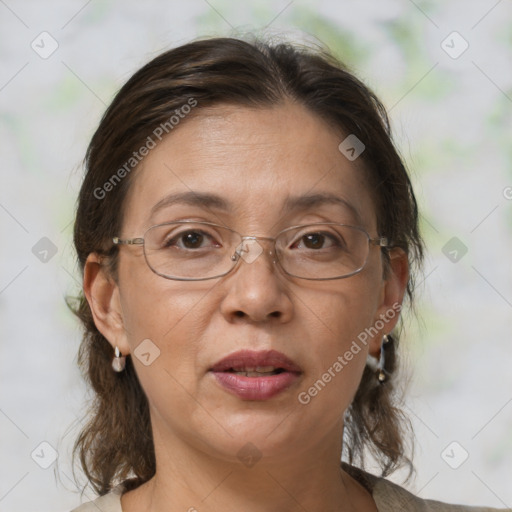 Joyful white adult female with medium  brown hair and brown eyes