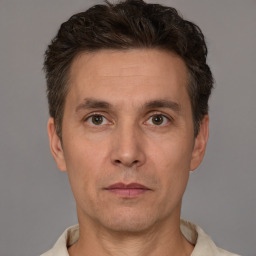 Neutral white adult male with short  brown hair and brown eyes